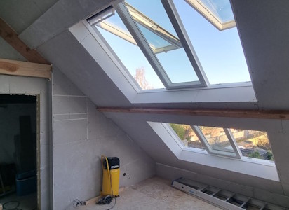 Aménagement d'un grenier à Beersel - Gyproc placé et jointoyé au Velux 3en1