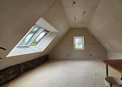 Aménagement d'un grenier à Overijse - Fin du gyproc dans la chambre aménagée