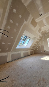 Aménagement d'un grenier à Overijse - Réalisation des enduits sur les plaques de plâtre